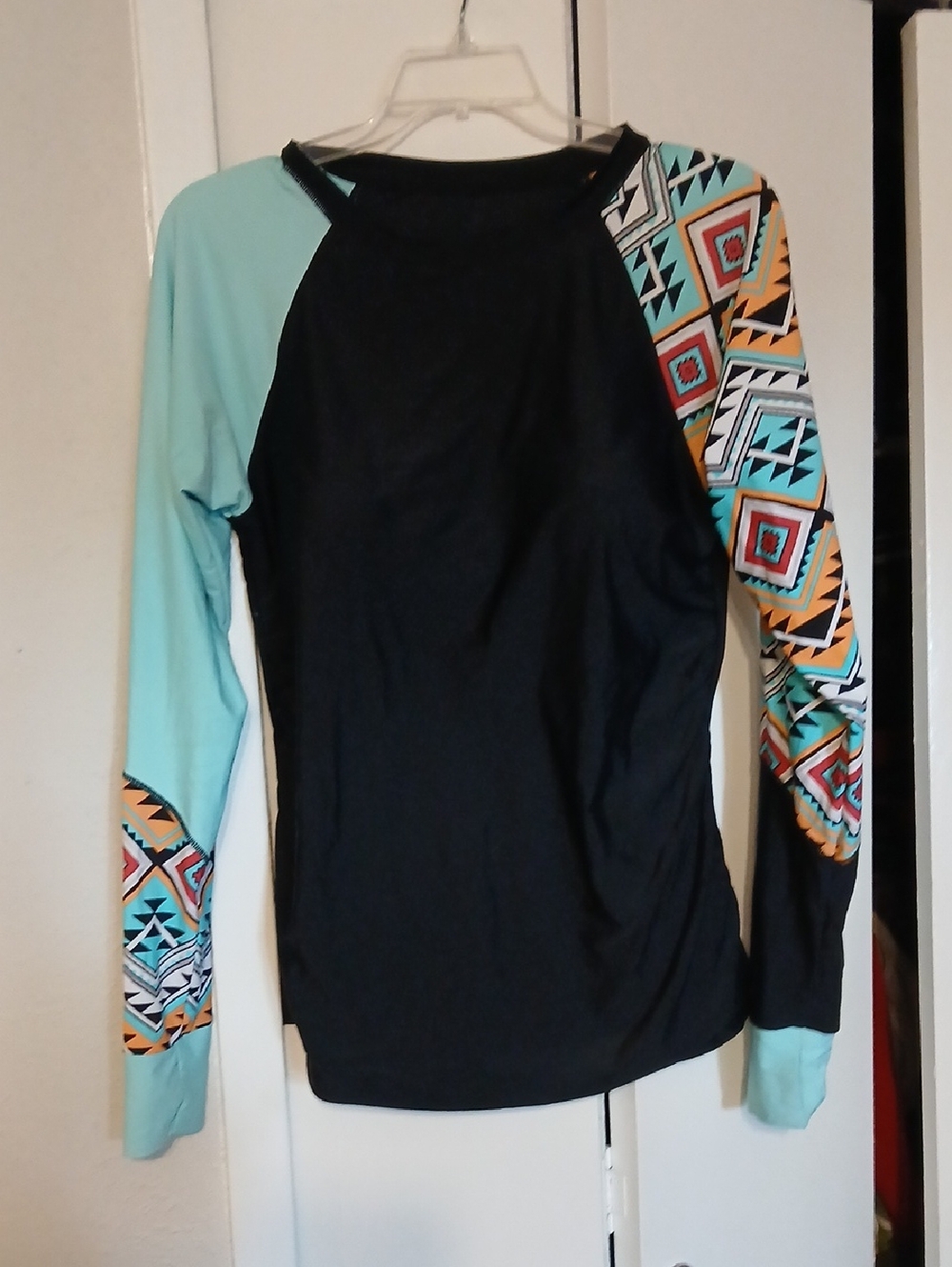 Women's Black Raglan Long Sleeve Swim Top with Aqua & Aztec Print Sleeves